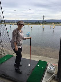 Woman golf playing